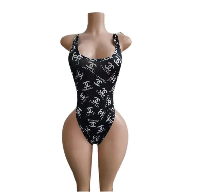 Black and white Chanel-patterned swimsuit.