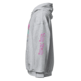 Y2K chrome glam hoodie shown from the side, featuring glossy pink bubble letters and chrome metallic elements.
