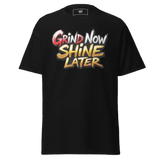 Black t-shirt with ’Grind Now Shine Later’ text.