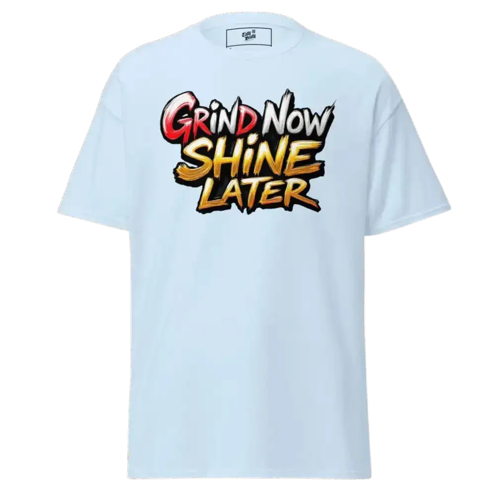 Light blue t-shirt with ’Grind Now Shine Later’ graphic.