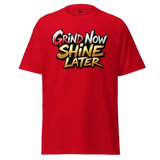 Red t-shirt with ’Grind Now Shine Later’ text.