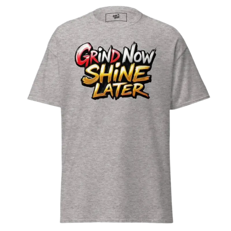 Gray t-shirt with ’Grind Now Shine Later’ graphic.