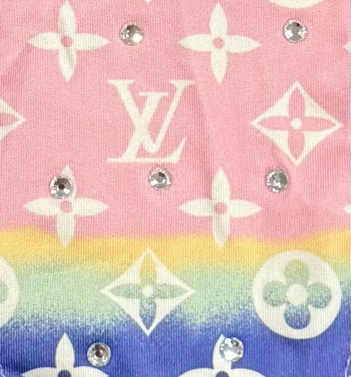 Pastel rainbow louis vuitton patterned fabric with rhinestones.