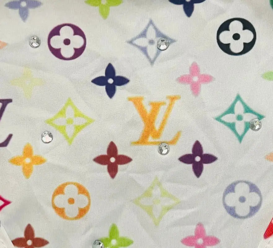 Colorful patterned fabric with rhinestones.