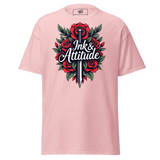 Pink t-shirt with rose and sword graphic.