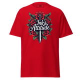 Red t-shirt with sword and roses graphic.