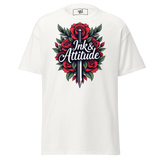 White t-shirt with rose and sword graphic.