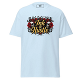 Light blue t-shirt with ’Ink & Hustle’ graphic.