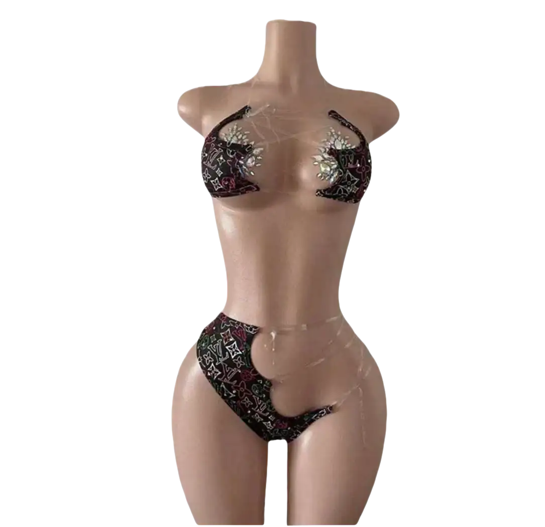 Mannequin wearing a black and silver bikini.