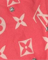 Pink louis vuitton bandana with white monogram pattern and rhinestones.