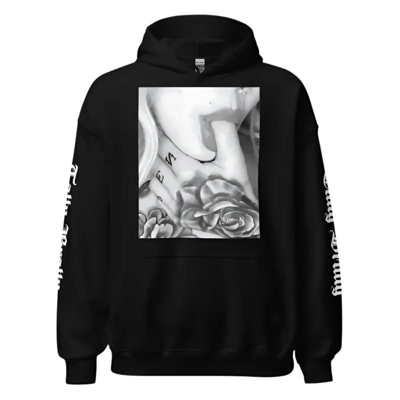 Black hoodie with a grayscale tattoo design.