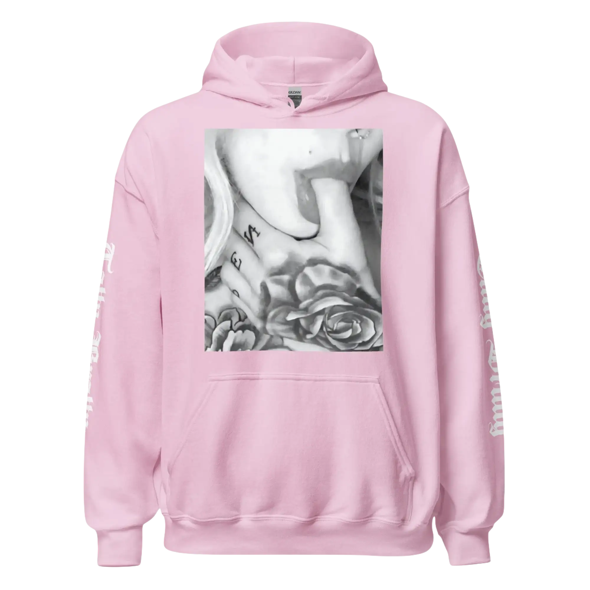 Pink hoodie with a tattoo graphic.