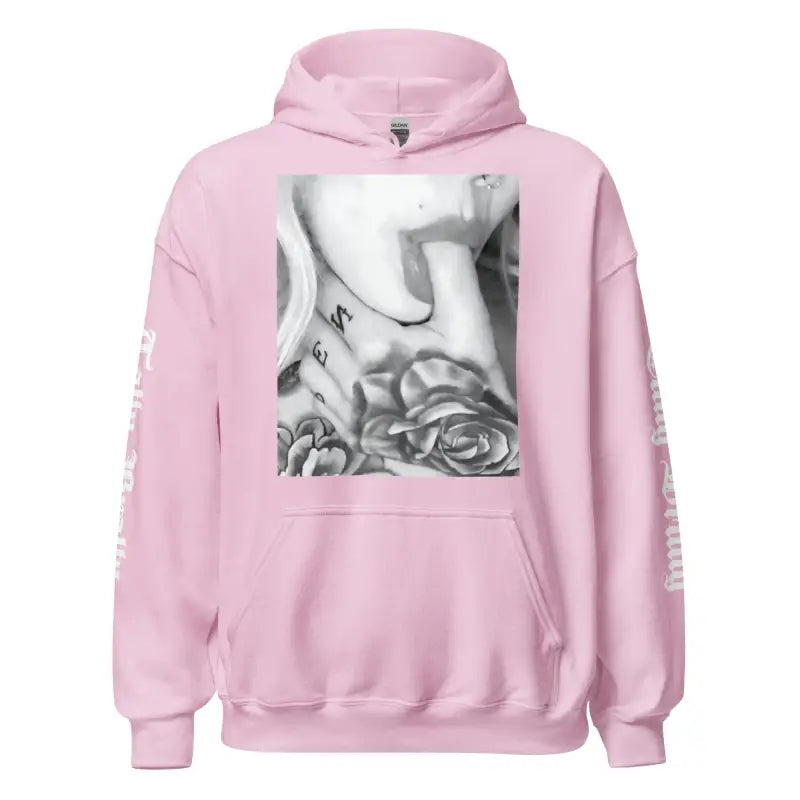 Pink hoodie with a tattoo graphic.