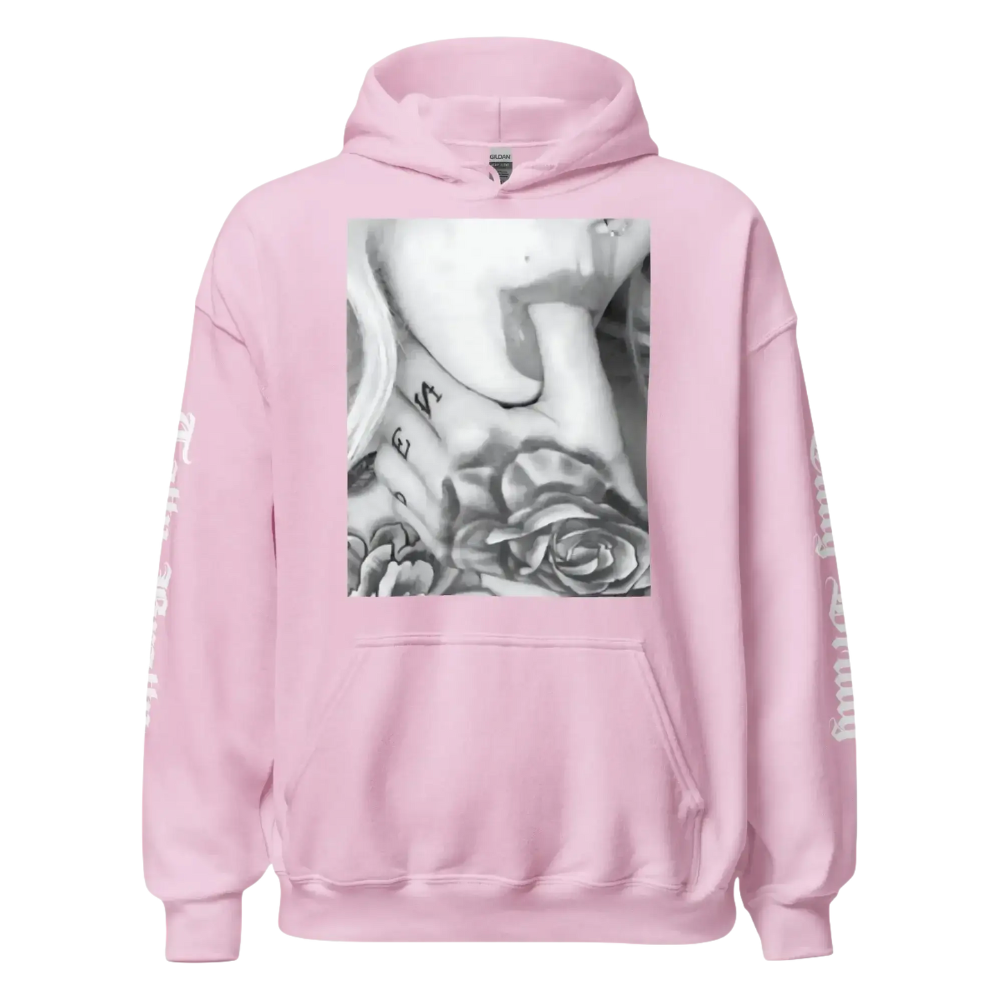 Pink hoodie with a tattoo graphic.