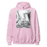Pink hoodie with a tattoo graphic.