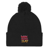 Black pom-pom beanie.