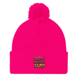 Bright pink beanie with pompom.