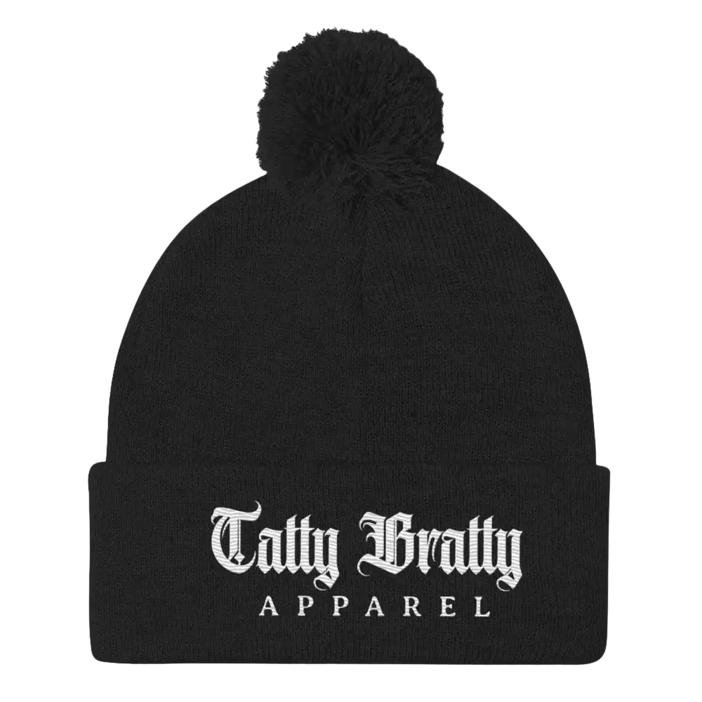 Black beanie with pompom.