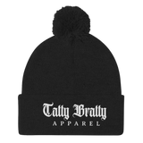 Black beanie with pompom.