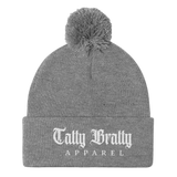 Gray knit beanie with pompom.