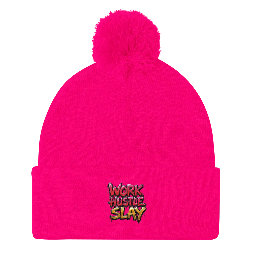 Bright pink beanie with pompom.