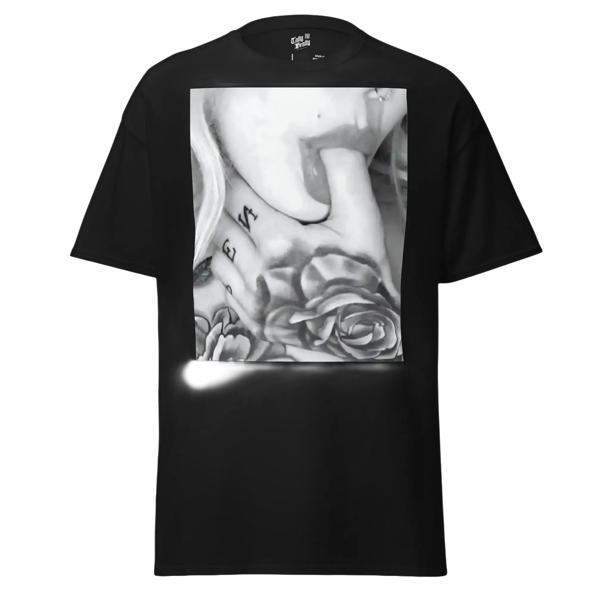 Black t-shirt with grayscale tattoo graphic.