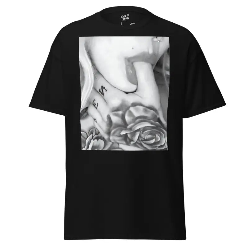 Black t-shirt with grayscale tattoo graphic.