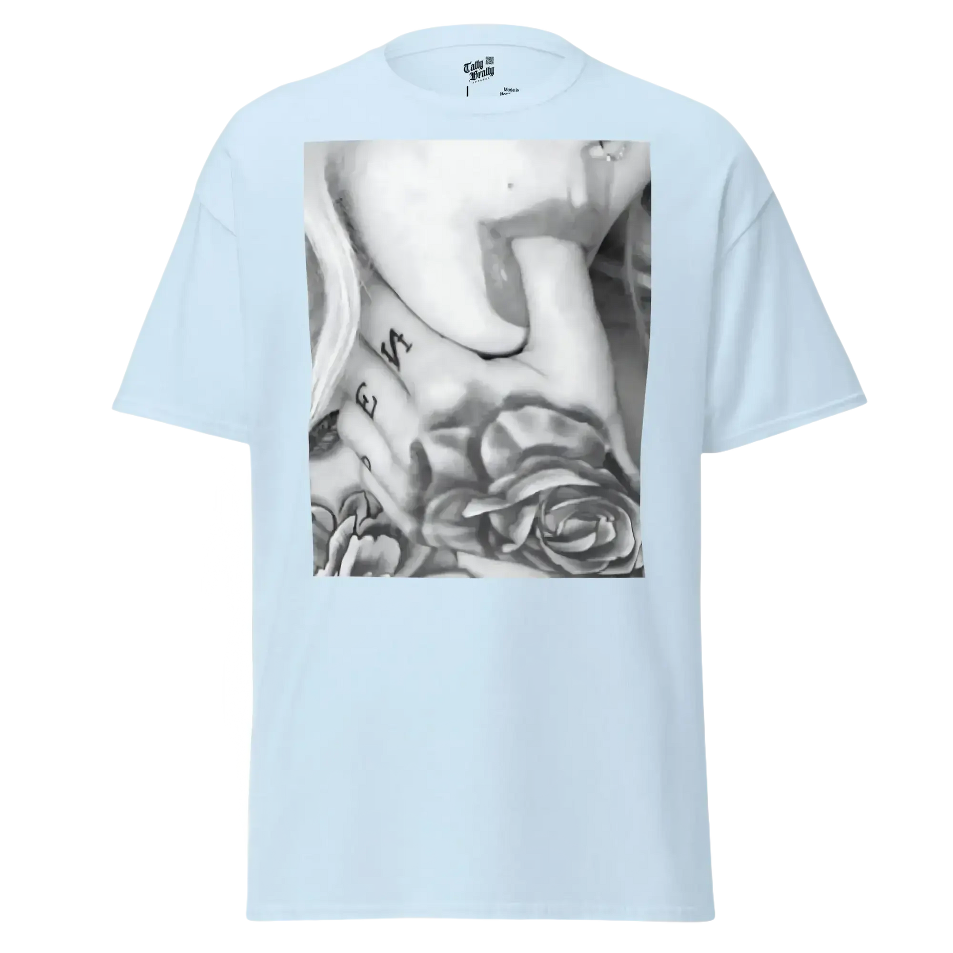 Light blue t-shirt with a black and white graphic.