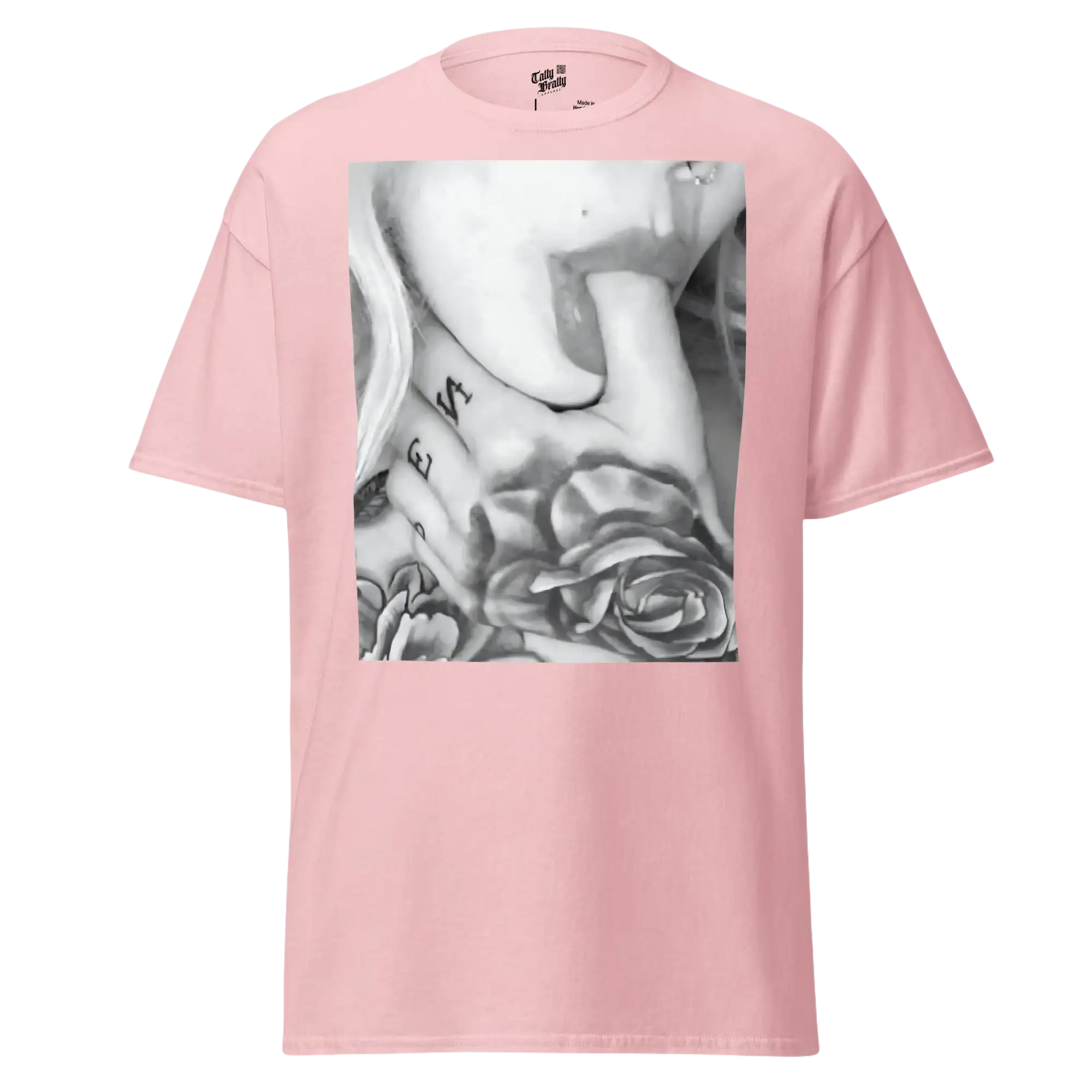Pink t-shirt with a black and white graphic.