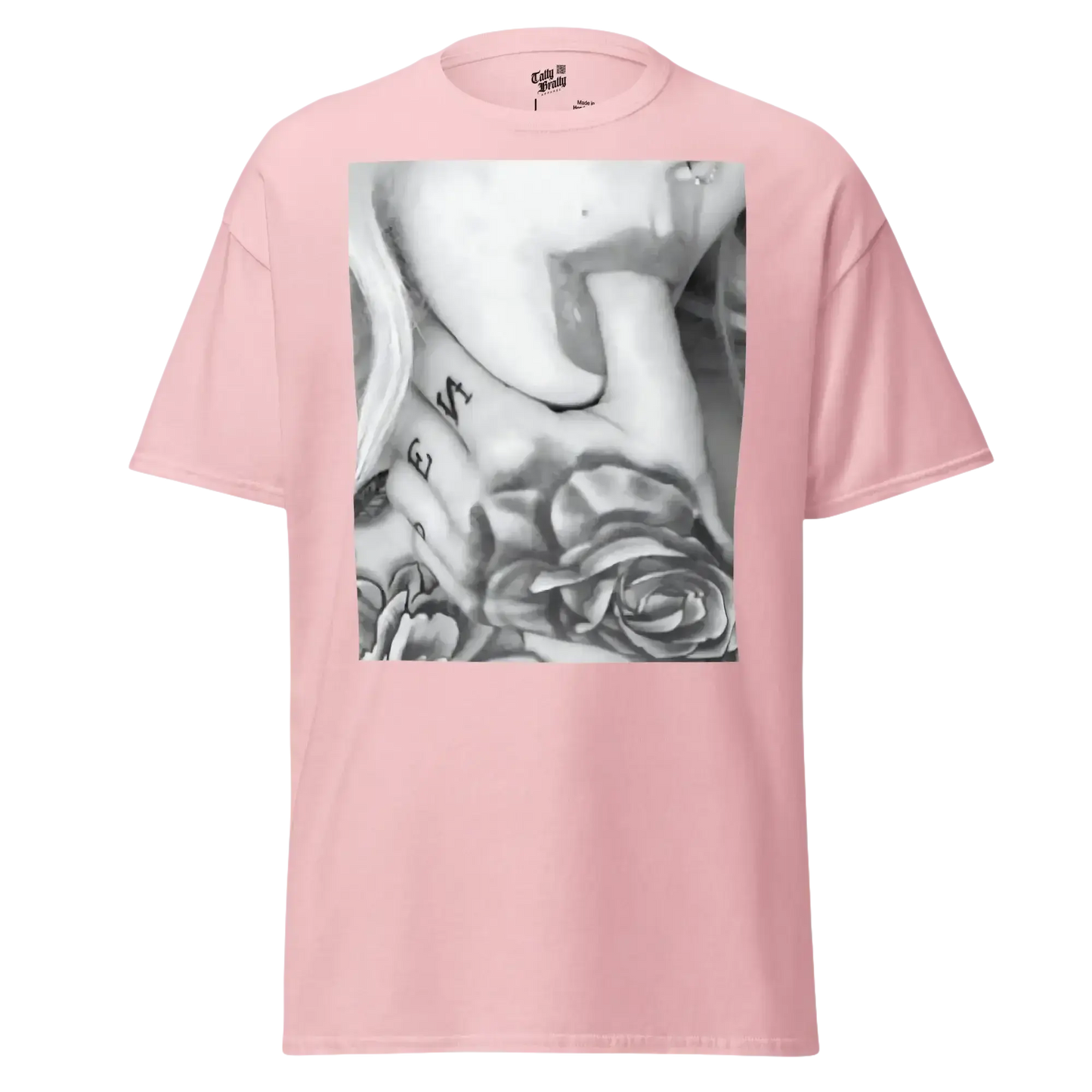 Pink t-shirt with a black and white graphic.