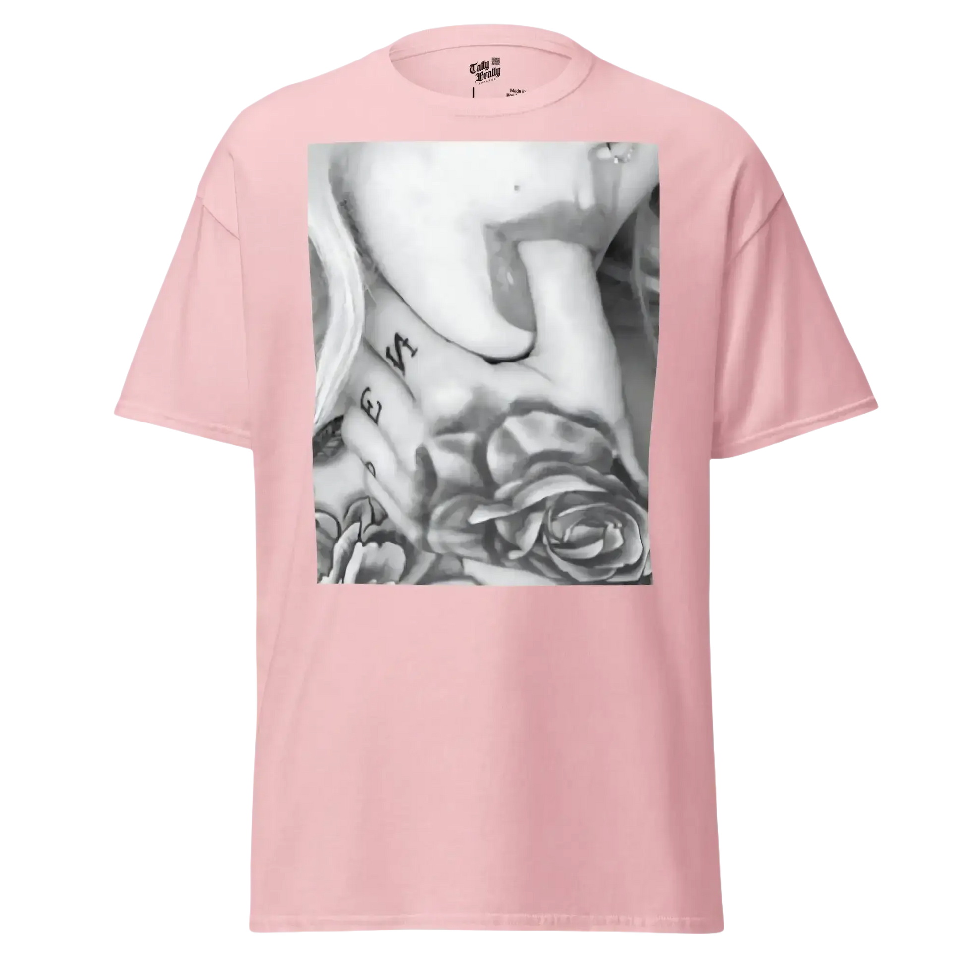 Pink t-shirt with a black and white graphic.