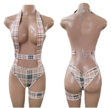 Plaid halter bodysuit with garter.