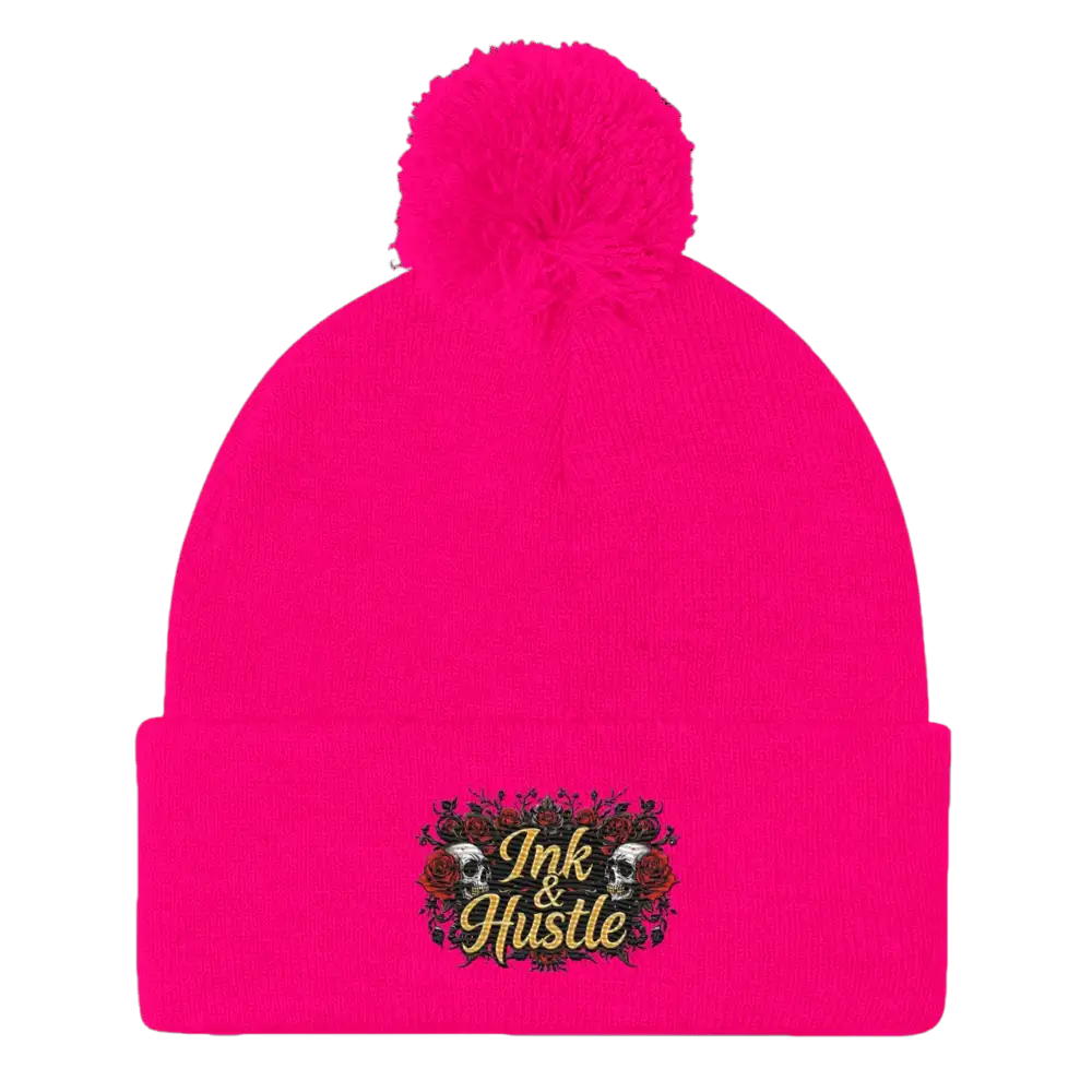 Bright pink beanie with pompom.