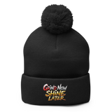 Black knit beanie with pompom.