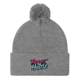 Gray knit beanie with pompom.