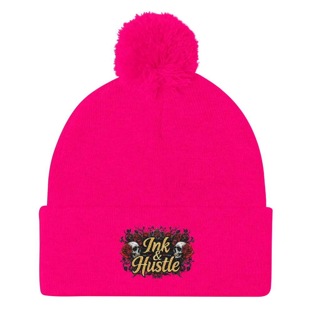 Bright pink beanie with pompom.