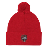 Red knit beanie with pompom.