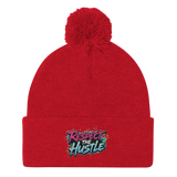 Red knit beanie with pompom.