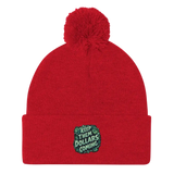 Red knit beanie with pompom.
