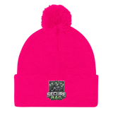 Bright pink beanie with pompom.