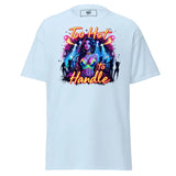 Light blue t-shirt with a ’Too Hot to Handle’ graphic.