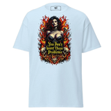 Light blue t-shirt with a woman, skulls, and flames graphic.