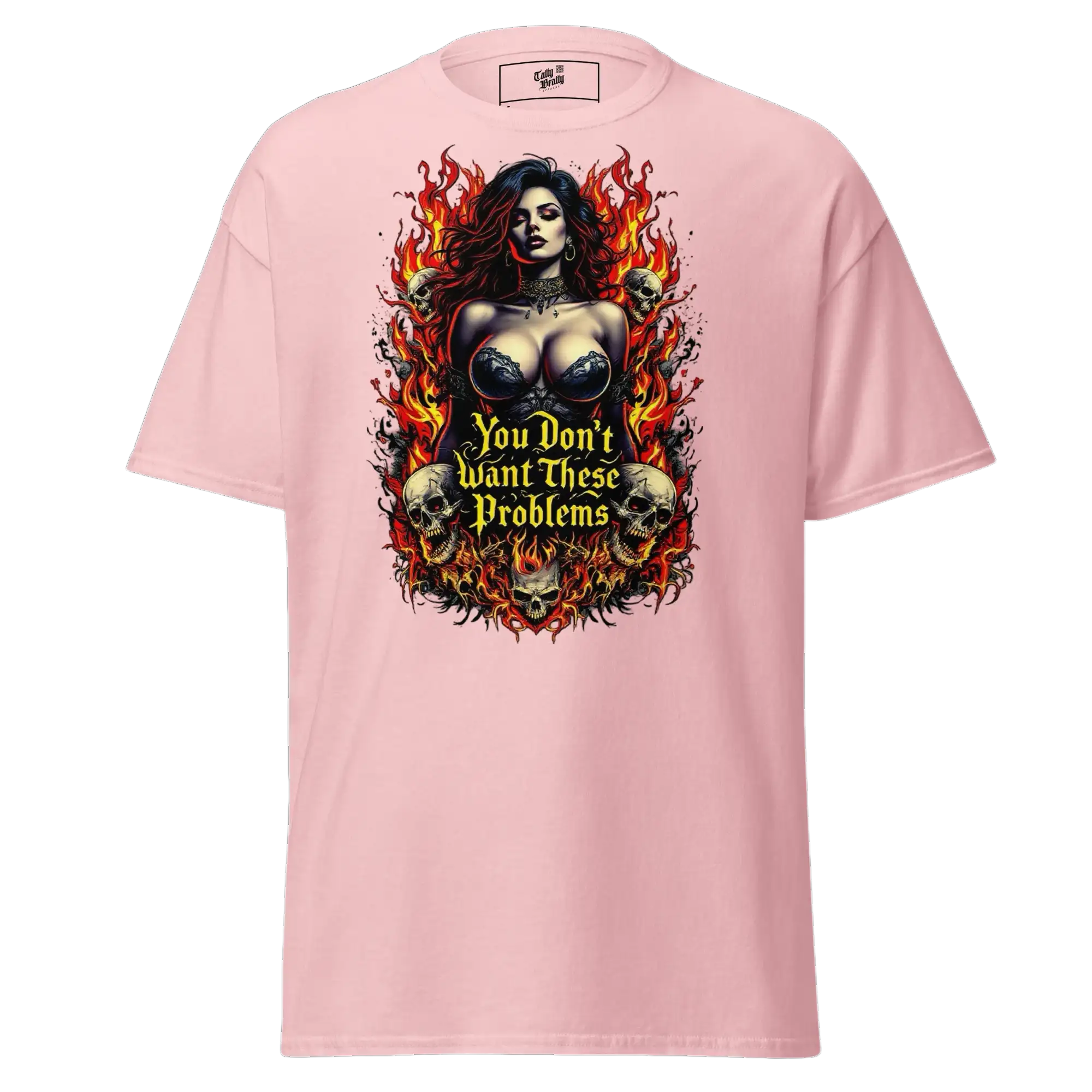 Pink t-shirt with a woman, skulls, and flames graphic.